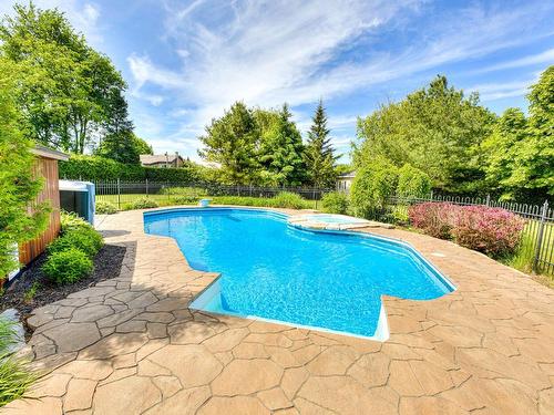 Piscine - 1301 Rue Jacques-De Chambly, Carignan, QC - Outdoor With In Ground Pool With Backyard