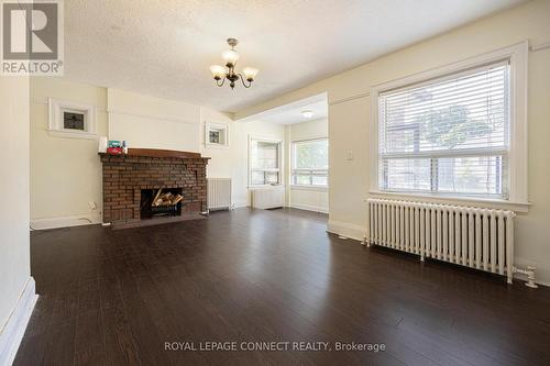 #Main - 184 Livingstone Avenue, Toronto (Briar Hill-Belgravia), ON - Indoor Photo Showing Other Room With Fireplace