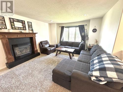 127 Barlow Avenue, Williams Lake, BC - Indoor Photo Showing Living Room With Fireplace