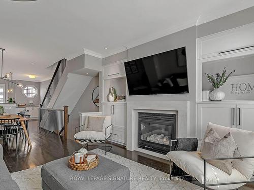 9 Furrow Lane, Toronto, ON - Indoor Photo Showing Living Room With Fireplace