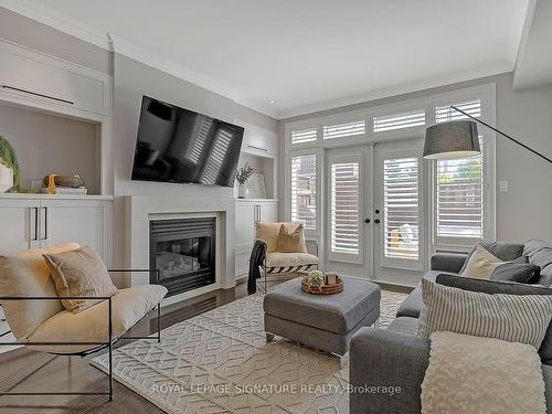 9 Furrow Lane, Toronto, ON - Indoor Photo Showing Living Room With Fireplace