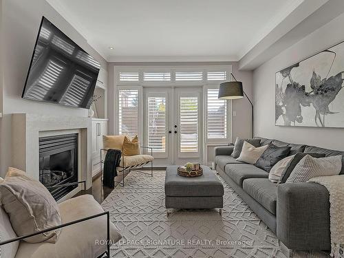 9 Furrow Lane, Toronto, ON - Indoor Photo Showing Living Room With Fireplace