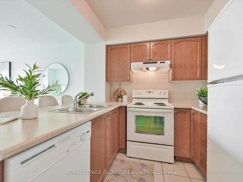 402-220 Forum Dr, Mississauga, ON - Indoor Photo Showing Kitchen With Double Sink