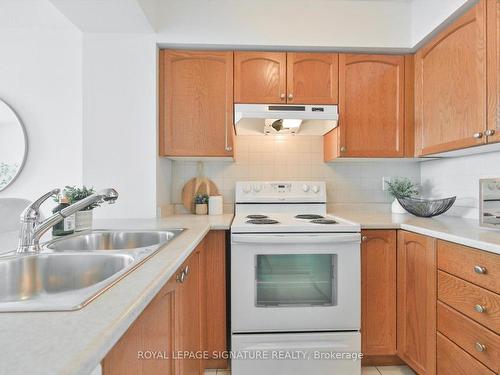 402-220 Forum Dr, Mississauga, ON - Indoor Photo Showing Kitchen With Double Sink