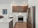 504-6540 Metral Dr, Nanaimo, BC  - Indoor Photo Showing Kitchen With Double Sink With Upgraded Kitchen 