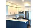 208-525 Third St, Nanaimo, BC  - Indoor Photo Showing Kitchen With Stainless Steel Kitchen With Double Sink With Upgraded Kitchen 