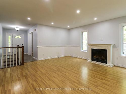 1463 River Rd, Wasaga Beach, ON - Indoor Photo Showing Other Room With Fireplace