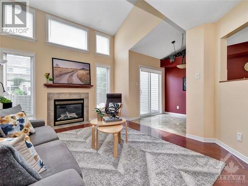 22 Kettleby Street, Ottawa, ON - Indoor Photo Showing Living Room With Fireplace
