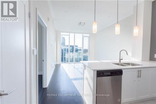 609 - 16 Concord Place, Grimsby, ON - Indoor Photo Showing Kitchen With Double Sink