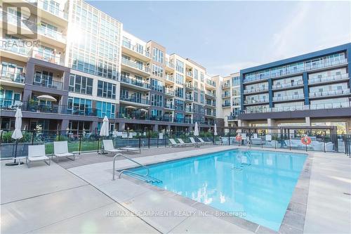 609 - 16 Concord Place, Grimsby, ON - Outdoor With In Ground Pool With Balcony