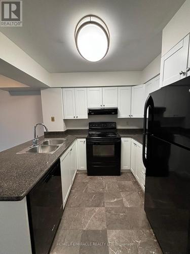 2210 - 750 Bay Street, Toronto, ON - Indoor Photo Showing Kitchen With Double Sink