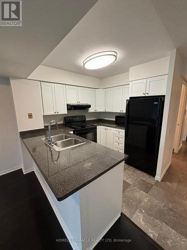 2210 - 750 Bay Street, Toronto, ON - Indoor Photo Showing Kitchen With Double Sink