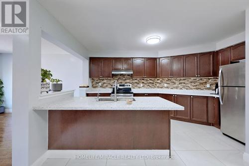 15 Masseyfield Street N, Brampton (Bram East), ON - Indoor Photo Showing Kitchen With Double Sink