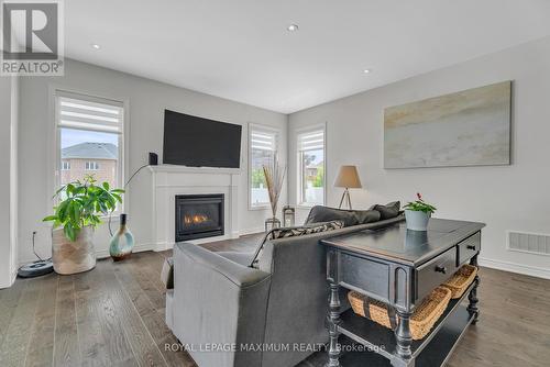 9 Copeland Crescent, Innisfil (Cookstown), ON - Indoor Photo Showing Living Room With Fireplace