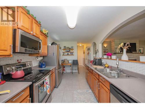 5648 Learmouth Road, Coldstream, BC - Indoor Photo Showing Kitchen With Double Sink