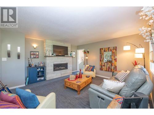 5648 Learmouth Road, Coldstream, BC - Indoor Photo Showing Living Room With Fireplace