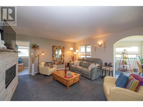 5648 Learmouth Road, Coldstream, BC - Indoor Photo Showing Living Room With Fireplace