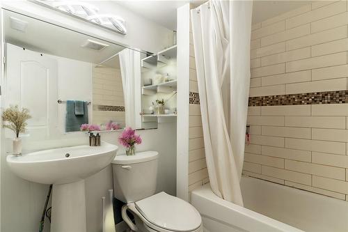 Virtually Staged - 609 Mohawk Road E, Hamilton, ON - Indoor Photo Showing Bathroom