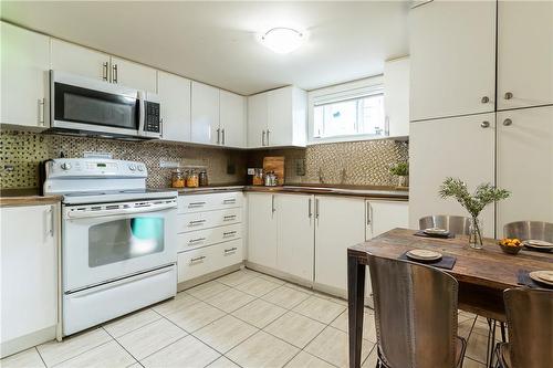 Virtually Staged - 609 Mohawk Road E, Hamilton, ON - Indoor Photo Showing Kitchen