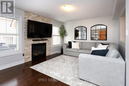 18 Tawnberry Circle, Brampton, ON - Indoor Photo Showing Living Room With Fireplace