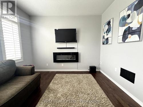 18 Tawnberry Circle, Brampton, ON - Indoor Photo Showing Living Room With Fireplace