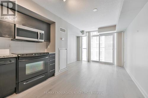 506 - 126 Simcoe Street, Toronto (Waterfront Communities), ON - Indoor Photo Showing Kitchen