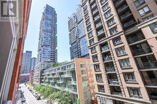 506 - 126 Simcoe Street, Toronto, ON - Outdoor With Facade