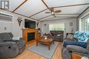 47 - 5216 County Road 90, Springwater, ON  - Indoor Photo Showing Living Room With Fireplace 