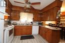 11 Bilokreli Bay, Theodore, SK  - Indoor Photo Showing Kitchen With Double Sink 