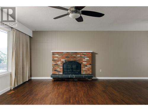 790 Caldow Street, Kelowna, BC - Indoor Photo Showing Other Room With Fireplace
