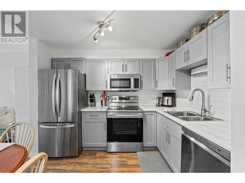 920 Saskatoon Road Unit# 213, Kelowna, BC - Indoor Photo Showing Kitchen With Double Sink