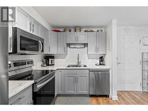 920 Saskatoon Road Unit# 213, Kelowna, BC - Indoor Photo Showing Kitchen With Double Sink