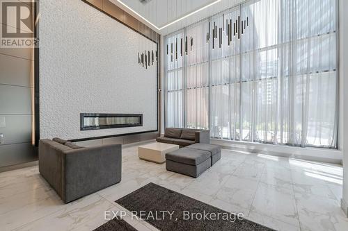 402 - 36 Forest Manor Road, Toronto, ON - Indoor Photo Showing Other Room With Fireplace