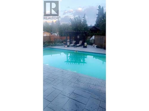 694 Mcclure Road, Kelowna, BC - Outdoor With In Ground Pool