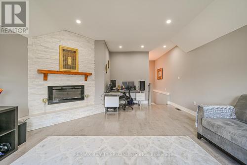 75 Wooliston Crescent, Brampton, ON - Indoor Photo Showing Living Room With Fireplace