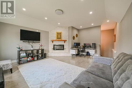75 Wooliston Crescent, Brampton, ON - Indoor Photo Showing Living Room With Fireplace
