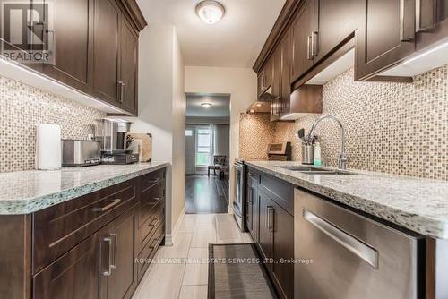 52 Tangle Briarway, Toronto, ON - Indoor Photo Showing Kitchen With Upgraded Kitchen