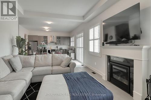 61 Cattail Crescent, Hamilton, ON - Indoor Photo Showing Living Room With Fireplace