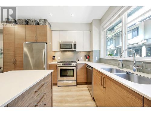 304 2135 Heritage Park Lane, North Vancouver, BC - Indoor Photo Showing Kitchen With Double Sink With Upgraded Kitchen