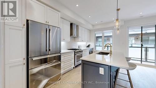 26 Hollyhock Court, Toronto, ON - Indoor Photo Showing Kitchen With Double Sink With Upgraded Kitchen