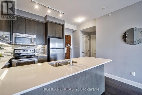 316 - 2480 Prince Michael Drive, Oakville, ON - Indoor Photo Showing Kitchen With Double Sink With Upgraded Kitchen