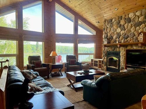 59 Poplar Bay, Kenora, ON - Indoor Photo Showing Living Room With Fireplace