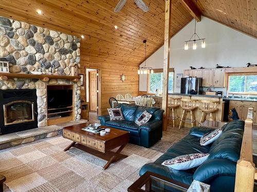 59 Poplar Bay, Kenora, ON - Indoor Photo Showing Living Room With Fireplace