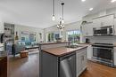 106-3606 25Th Avenue, Vernon, BC  - Indoor Photo Showing Kitchen With Stainless Steel Kitchen With Double Sink 