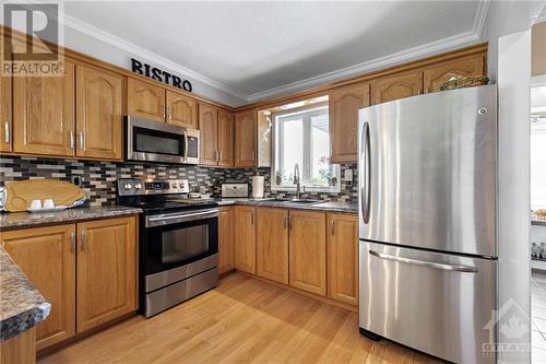 3004 Dunning Road, Ottawa, ON - Indoor Photo Showing Kitchen With Double Sink