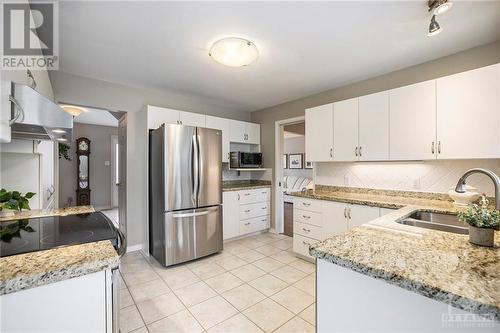 Kitchen updated with all new appliances - 5 Springwood Circle, Ottawa, ON - Indoor Photo Showing Kitchen With Double Sink