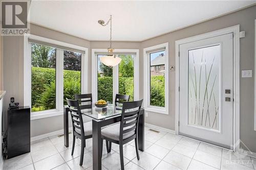 Sun soaked breakfast nook overlooking the backyard - 5 Springwood Circle, Ottawa, ON - Indoor Photo Showing Dining Room