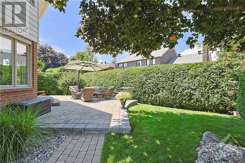 Tasteful interlock, gorgeous gardens and complete privacy in this backyard - 5 Springwood Circle, Ottawa, ON - Outdoor