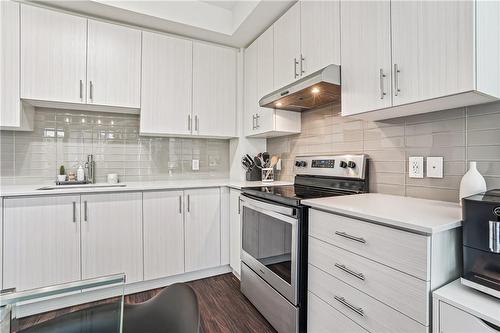 320 Plains Road E|Unit #211, Burlington, ON - Indoor Photo Showing Kitchen With Upgraded Kitchen
