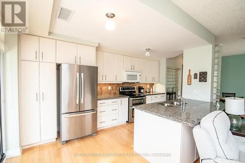 Ph 13 - 125 Wilson Street W, Hamilton, ON - Indoor Photo Showing Kitchen With Double Sink